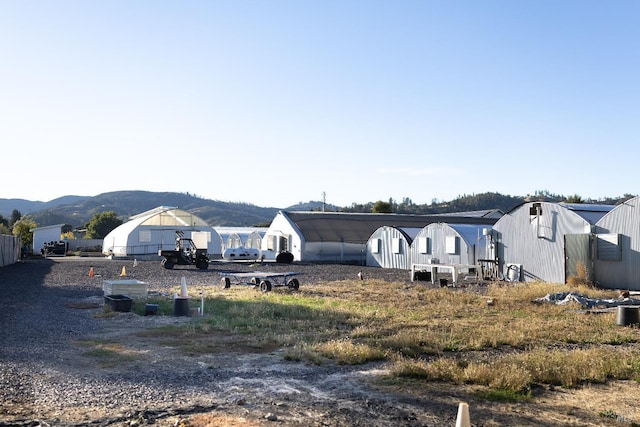 exterior space with a mountain view