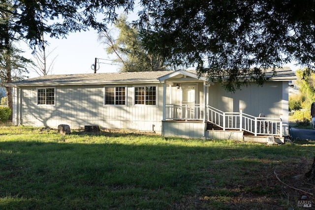 view of front of house with a front lawn