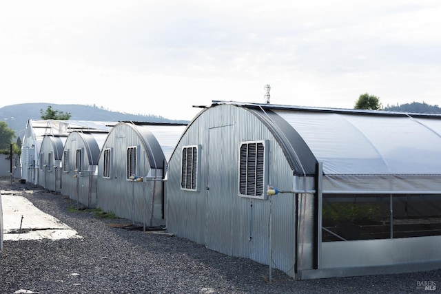 exterior space with a mountain view