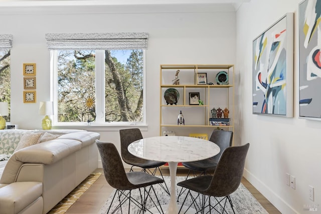 dining room with hardwood / wood-style flooring