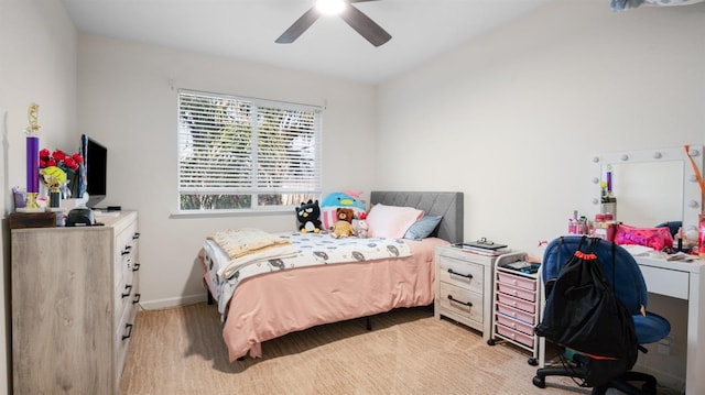 bedroom with baseboards and ceiling fan