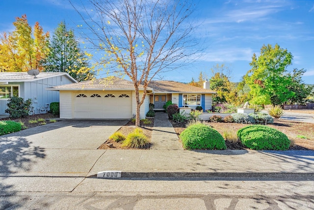 ranch-style home with a garage