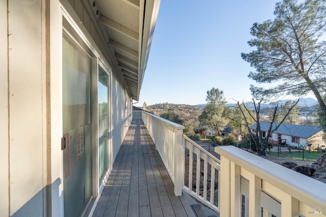 balcony featuring a mountain view