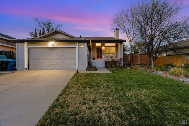 view of front of house with a garage, covered porch, fence, a front lawn, and driveway