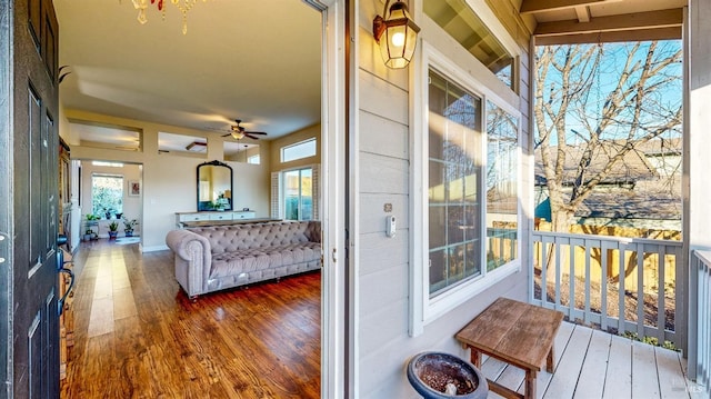 exterior space featuring a porch and ceiling fan