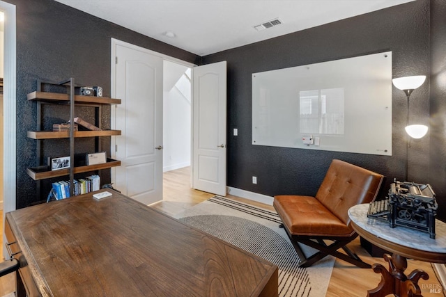 office space featuring light wood-type flooring