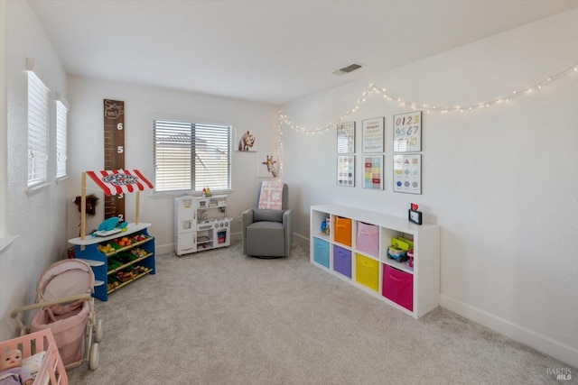 playroom featuring carpet