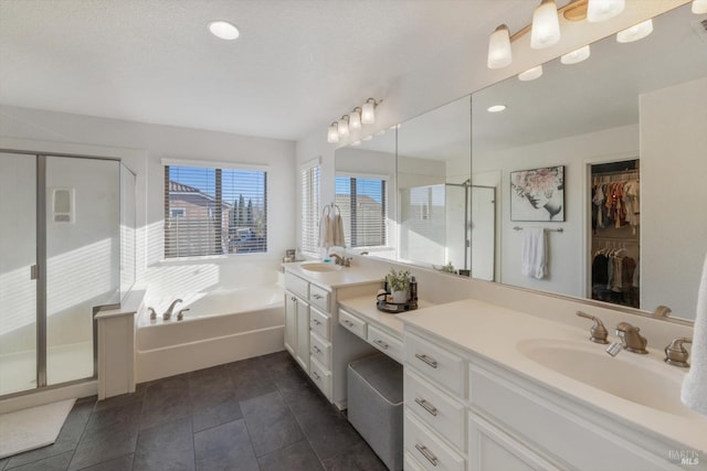 bathroom with plus walk in shower and vanity