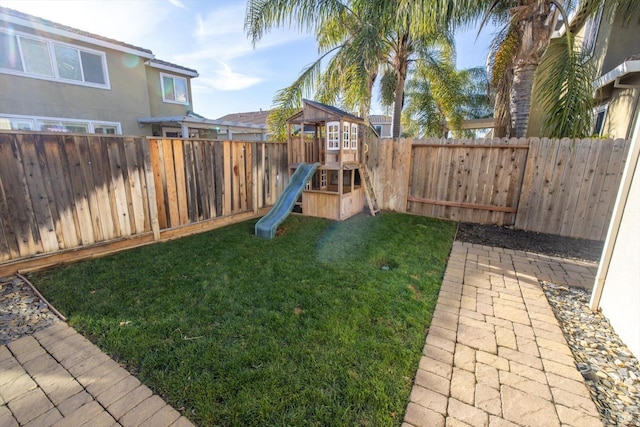 view of yard featuring a playground