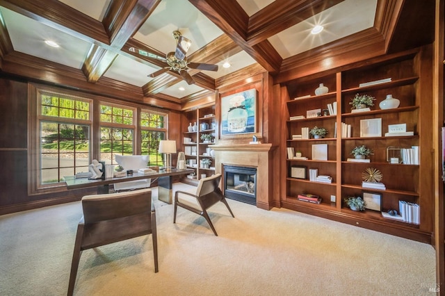 office featuring beamed ceiling, coffered ceiling, light colored carpet, and built in features