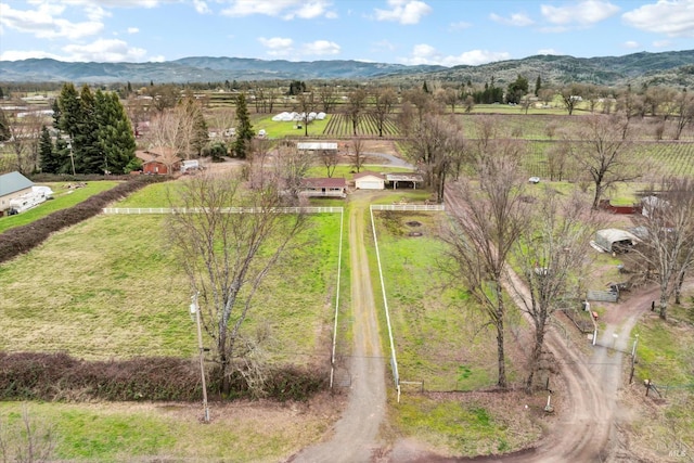 bird's eye view with a rural view and a mountain view