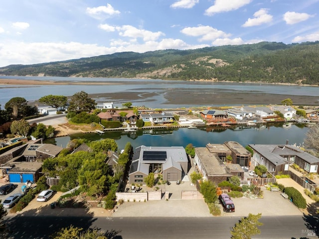 aerial view featuring a residential view and a water view