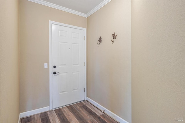 doorway with dark hardwood / wood-style flooring and ornamental molding