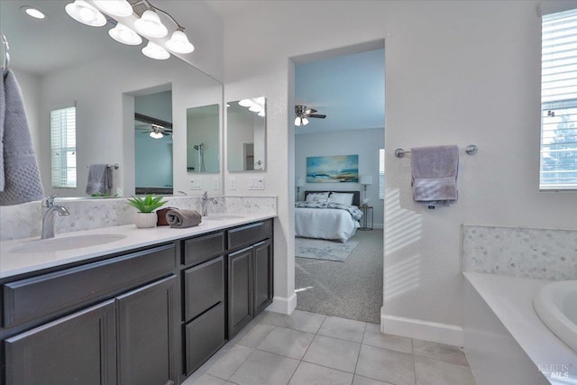 bathroom featuring tile patterned flooring, vanity, plenty of natural light, and ceiling fan