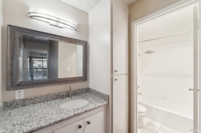 full bathroom with shower / bathtub combination, vanity, toilet, and tile patterned flooring