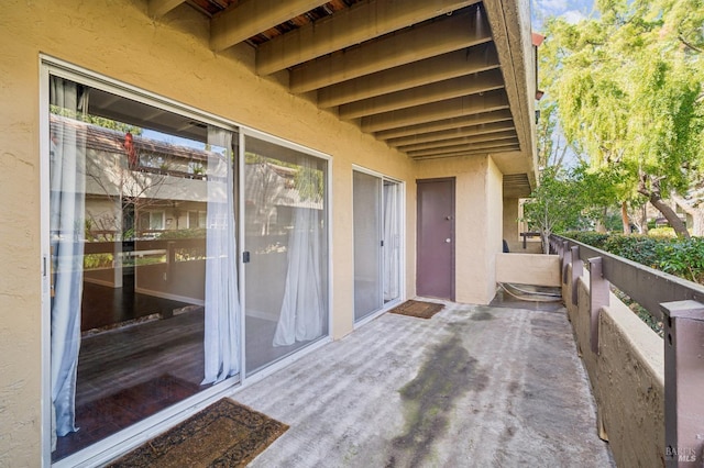 view of patio with a balcony