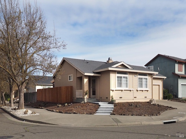 view of front of property featuring a garage