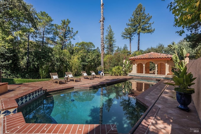 107 Deer Hollow Rd, San Anselmo, CA 94960 - outdoor pool with a patio area and view of wooded area