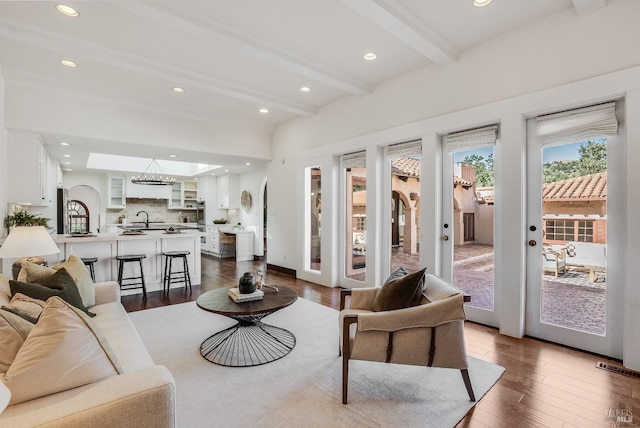 107 Deer Hollow Rd, San Anselmo, CA 94960 - living area featuring dark wood finished floors, beamed ceiling, and recessed lighting