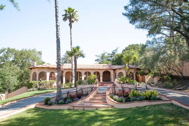 107 Deer Hollow Rd, San Anselmo, CA 94960 - mediterranean / spanish-style house with stucco siding, a front yard, and a tiled roof