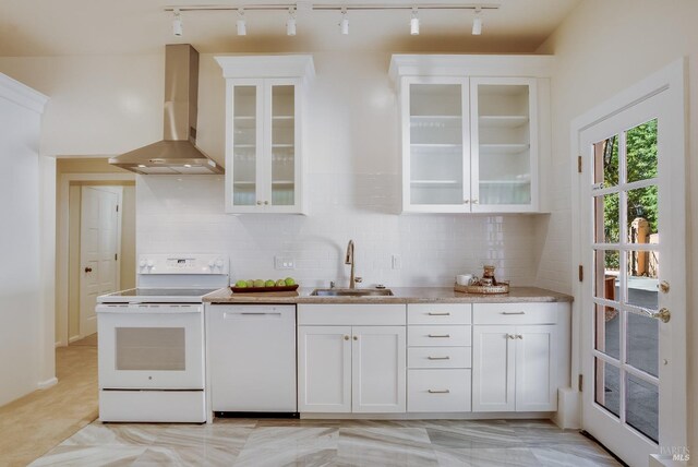 107 Deer Hollow Rd, San Anselmo, CA 94960 - kitchen featuring white appliances, wall chimney exhaust hood, a sink, rail lighting, and white cabinetry