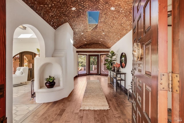 107 Deer Hollow Rd, San Anselmo, CA 94960 - foyer with arched walkways, crown molding, dark wood finished floors, and lofted ceiling