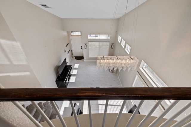 stairs with a high ceiling