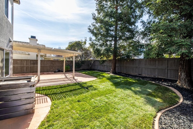 view of yard with a pergola and a patio