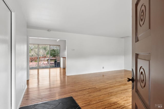 living room with light hardwood / wood-style flooring