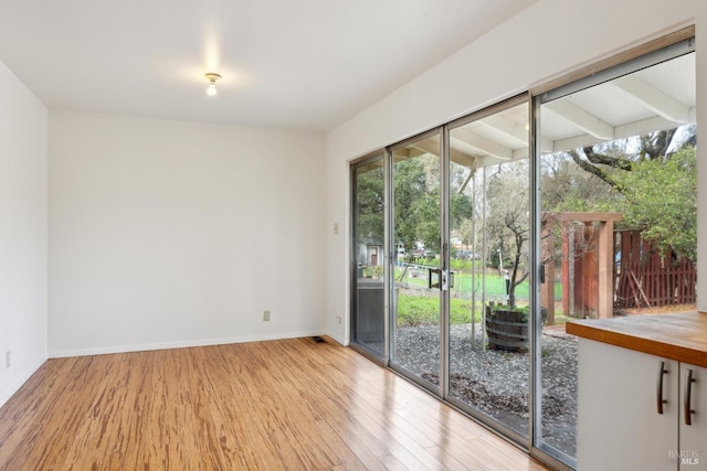 doorway to outside featuring light hardwood / wood-style floors