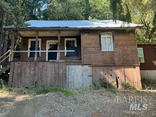 view of home's exterior with covered porch