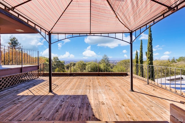 wooden terrace with a gazebo