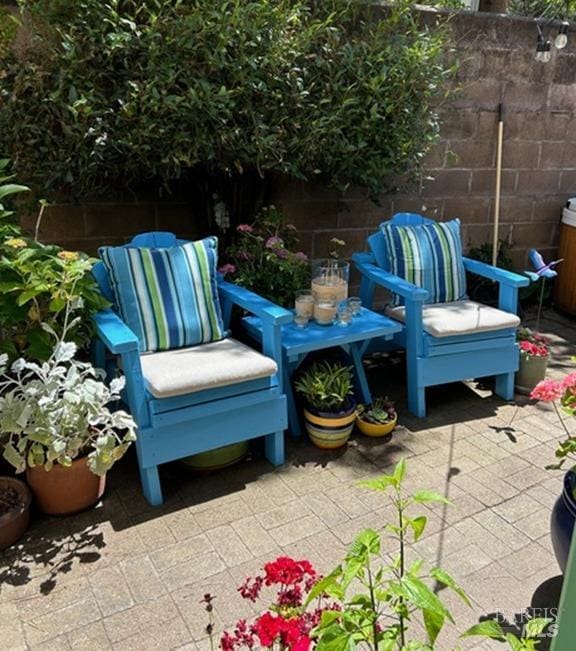 view of patio / terrace with fence