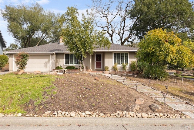 ranch-style home with a garage