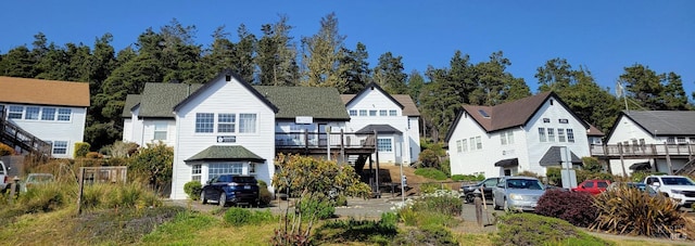 view of front of property featuring a deck