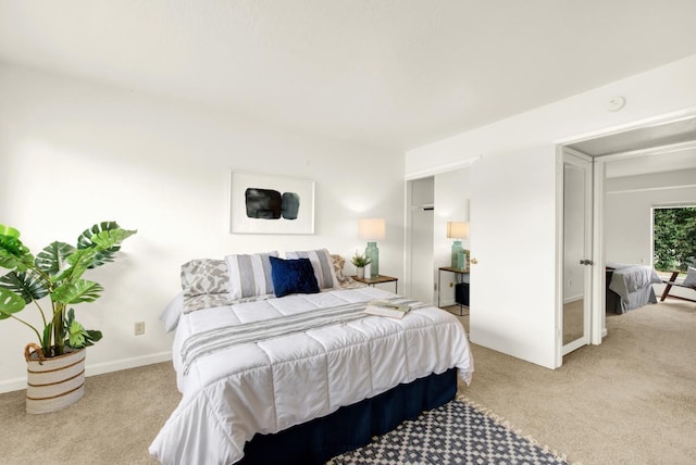 bedroom with light carpet