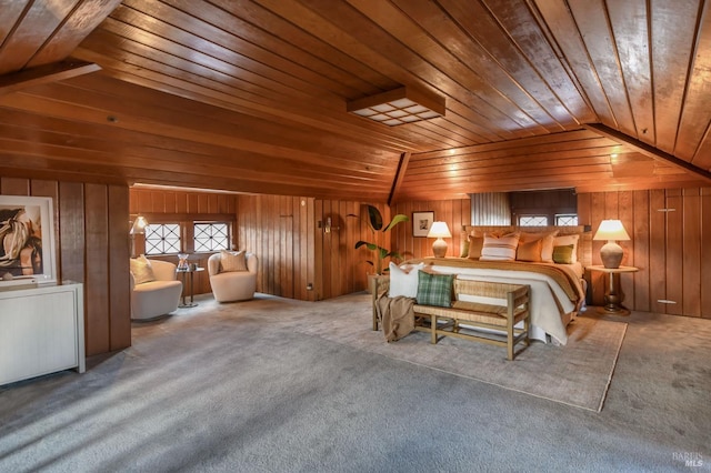 carpeted bedroom with wooden ceiling, wood walls, and vaulted ceiling