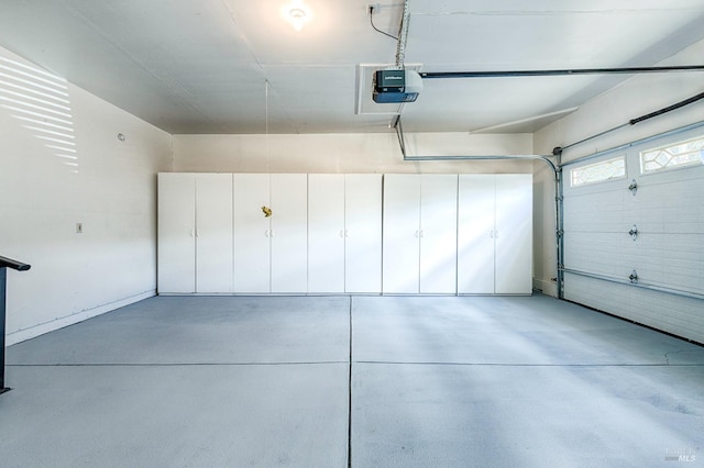 garage featuring a garage door opener
