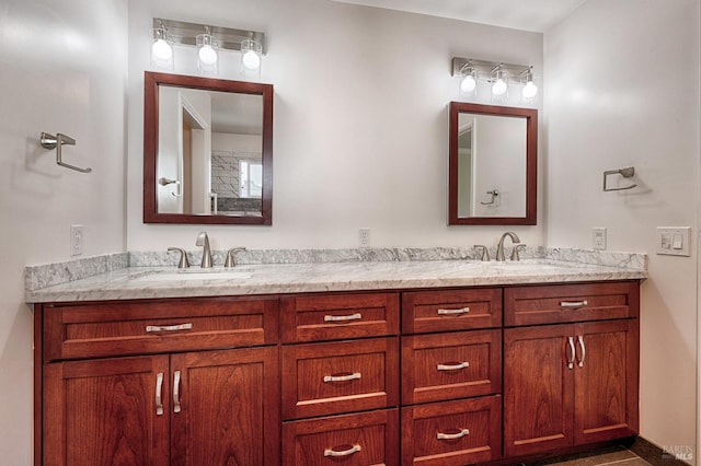 bathroom with double vanity and a sink