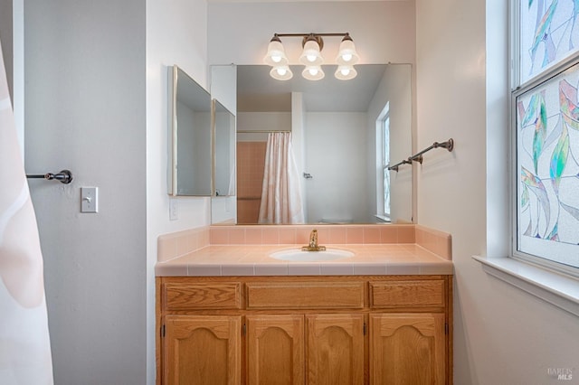 full bath featuring vanity