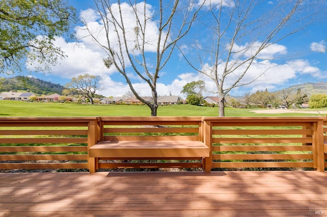 wooden deck with a yard