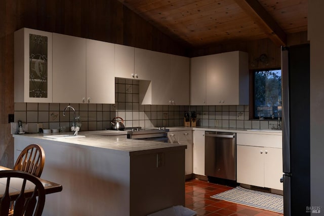 kitchen featuring white cabinets, kitchen peninsula, sink, and dishwasher