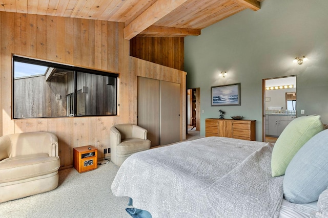 carpeted bedroom with high vaulted ceiling, wooden ceiling, beamed ceiling, and wood walls