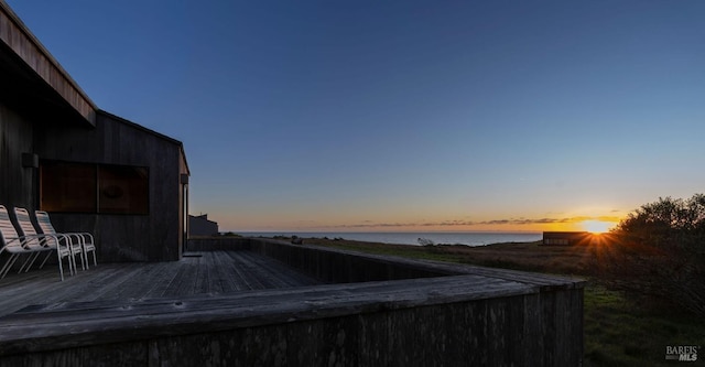 deck at dusk with a water view