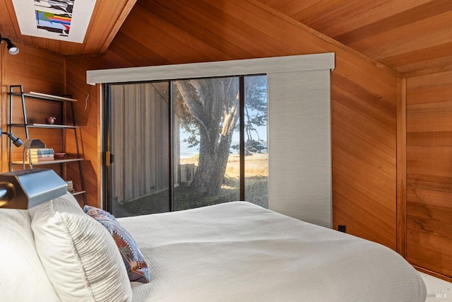 bedroom featuring access to exterior, wooden walls, and wooden ceiling