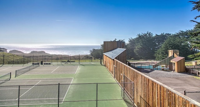 view of sport court with a mountain view