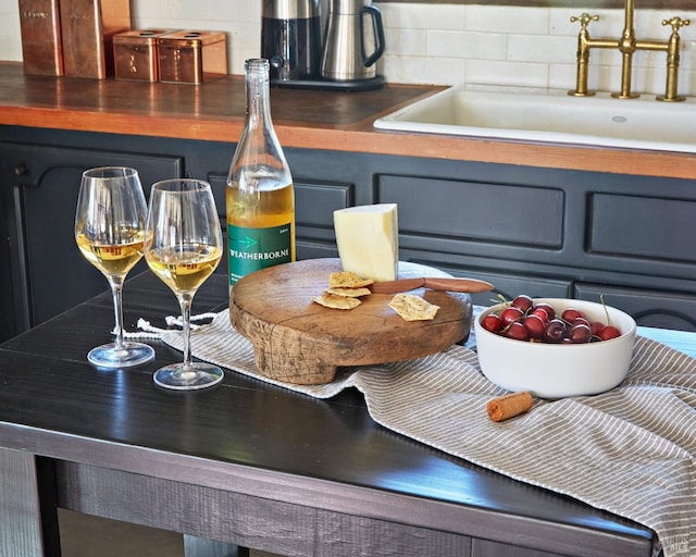 room details with backsplash and a sink