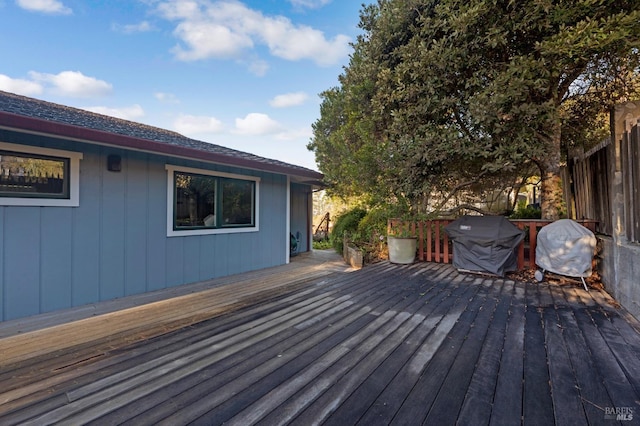 wooden deck featuring fence and grilling area