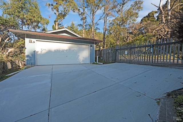 detached garage with fence