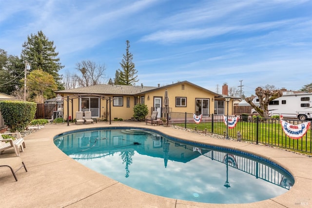 view of swimming pool with a fenced in pool, fence private yard, a yard, and a patio